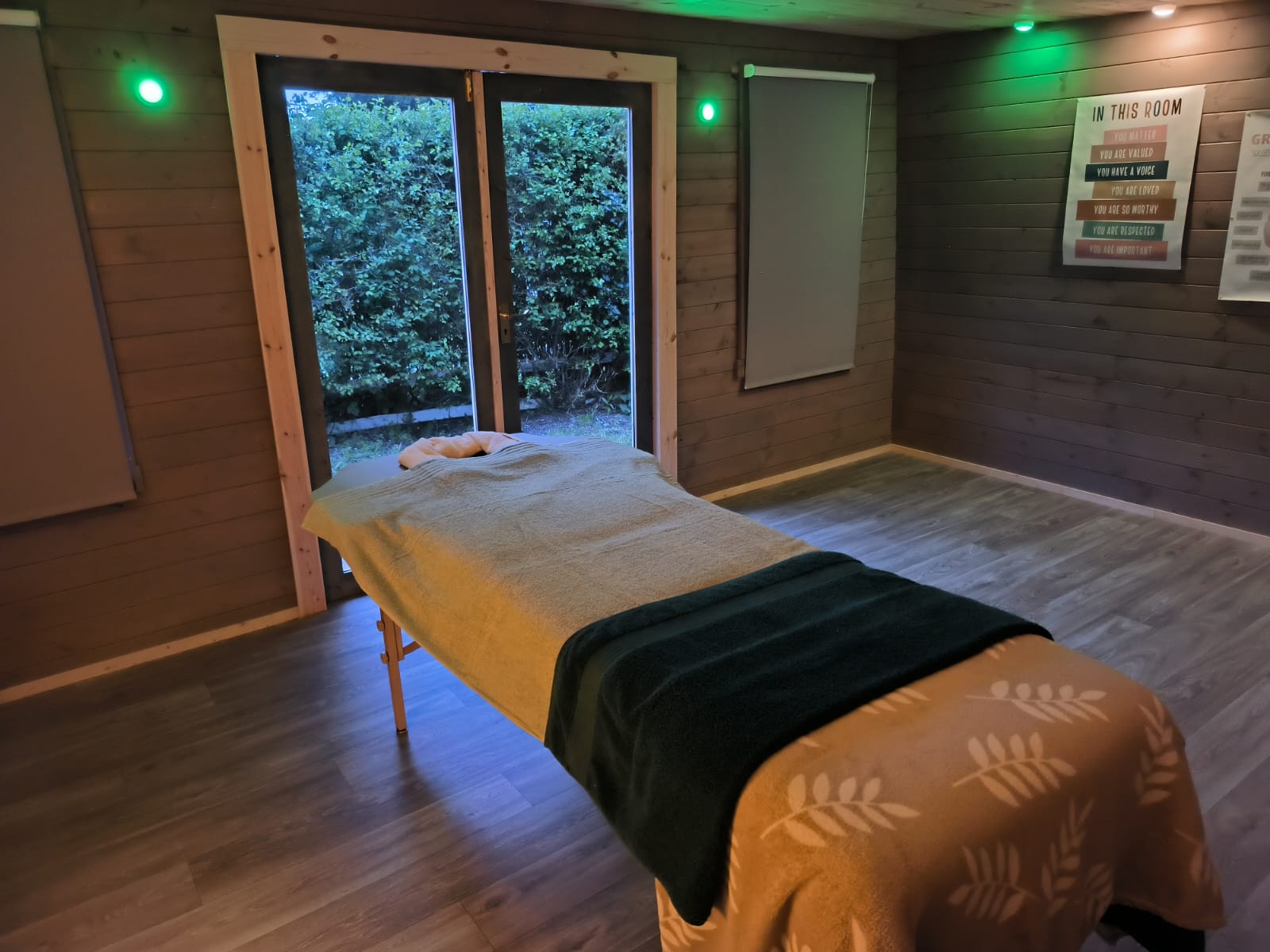 KAMI studio — treatment room with garden view